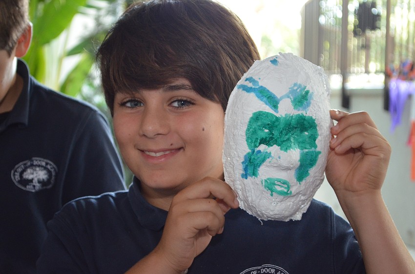 Masks were decorated with markers and feathers.
