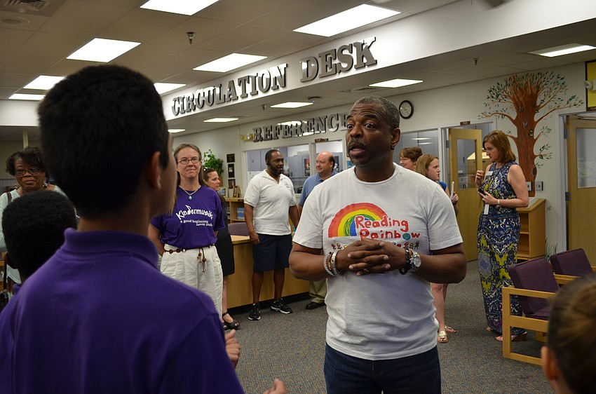 LeVar Burton greets fifth-grader Kevin Garcia.