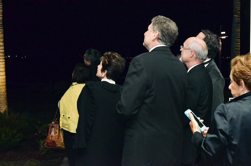 Guests watch a fireworks show over Sarasota Bay at The Sarasota Ballet 24th Season Gala.