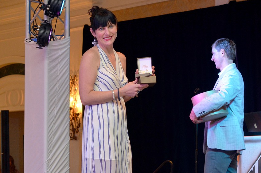 Richeal Parisi won the raffle provided by Carats Fine Jewelry and Watches.