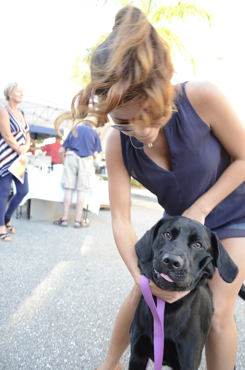 Chelsea Hoffner gets her dog Stella to smile for the camera.