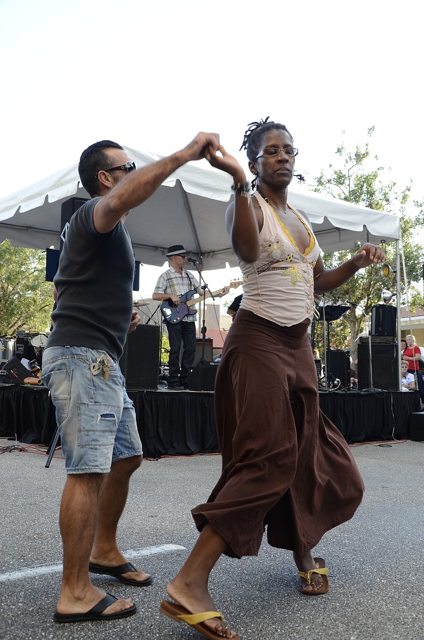 Placido and Errika Magra dance salsa during the live music.
