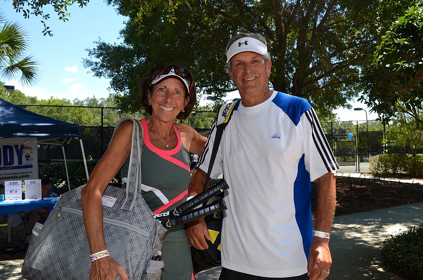 Barbara and Bob Chalson are avid tennis players who played on open courts throughout the event.
