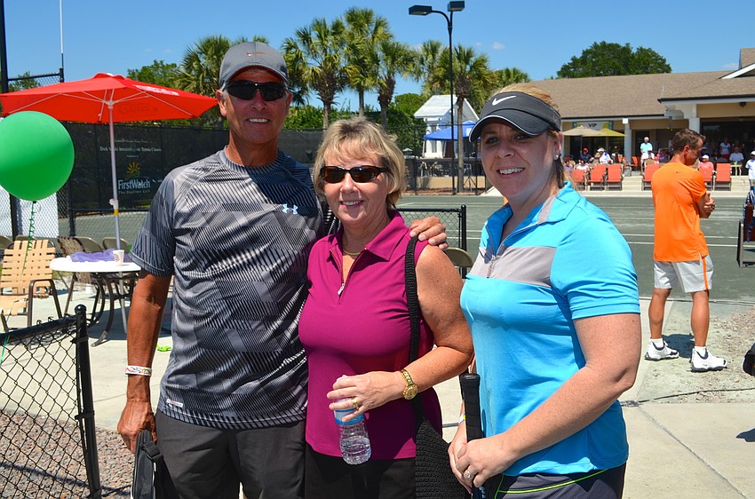 Jack and Suzette Ventrone find close spots near the tennis match with friend Laura Way.