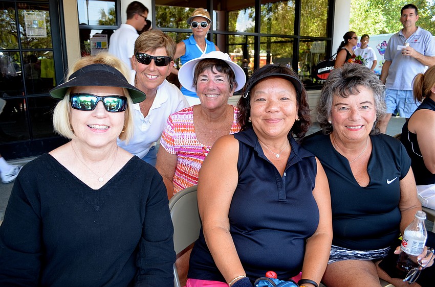 Tina Gardner, Bobbie Meyers, Rosemary DeMarco, Arline Stein and Gail Calisoff cheer from the stands during the first matchup of the day.