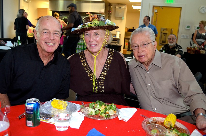 John McDermott shares laughs with his friends, Veronica and George Sengiel.