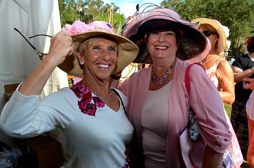 Lakewood Ranch Women’s Club members Wilma Nourie and Trish Newman show off their pink pride.