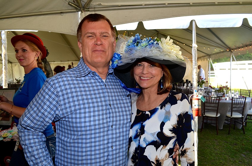 John Hanchak enjoys an afternoon out with his wife, Jere, who dresses for the occasion