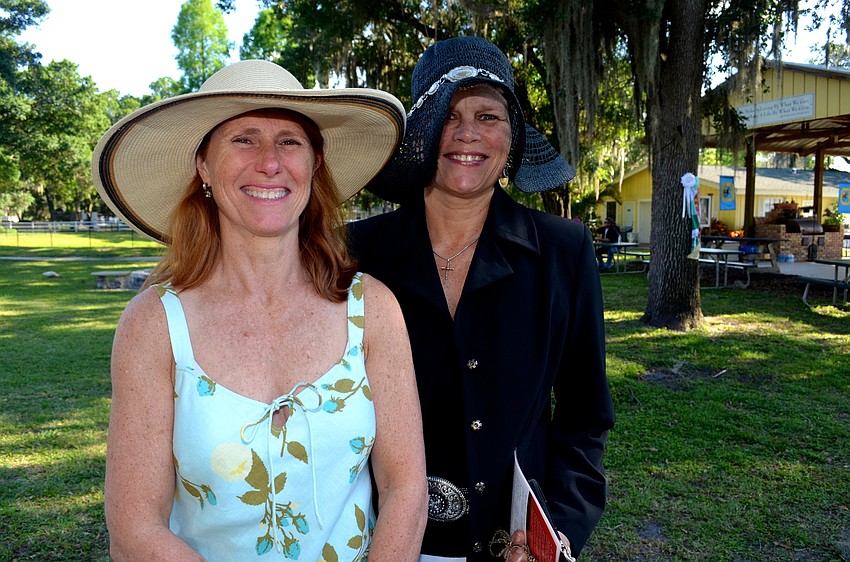 Cyndi Jaegge and Jody Jorgensen pulled out their floppy hats just in time for Kentucky Derby day.
