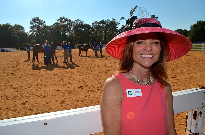 New Executive Director of SMART Christine Kasten shows off a pretty in pink derby outfit.
