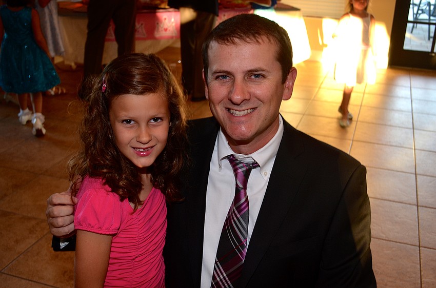 Riley and Eric Rueping head to the dance floor during a Taylor Swift song.