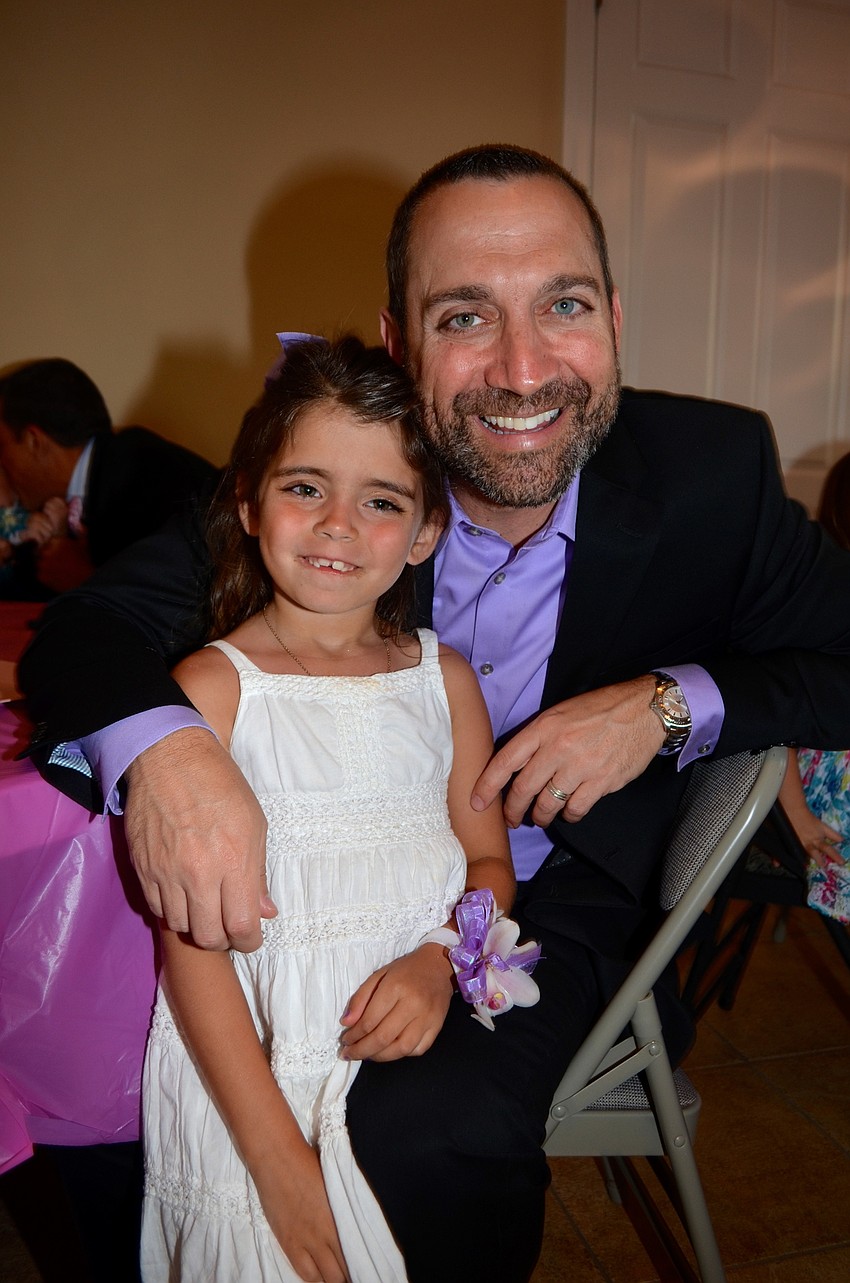 Chloe Tullio and her father, Mike, prefer eating and talking to dancing.