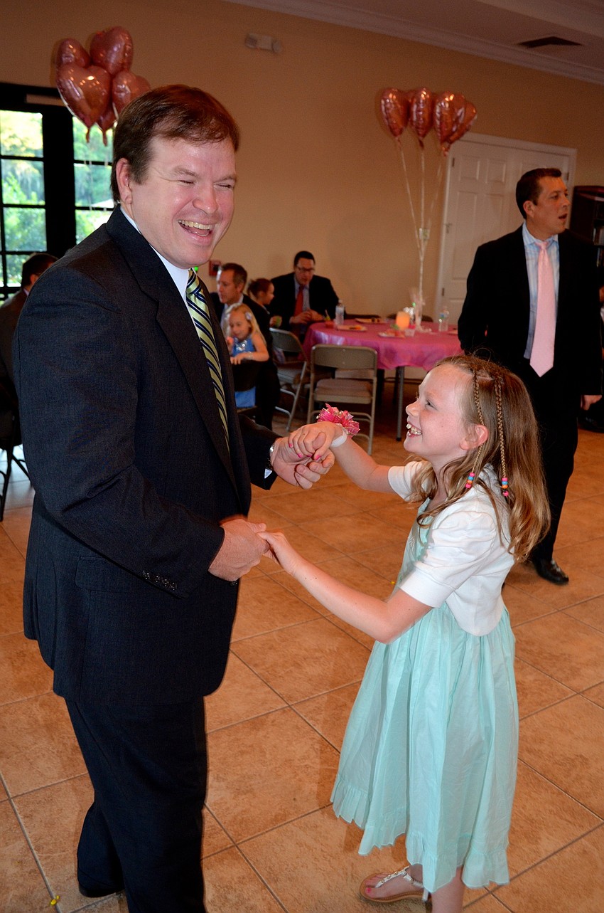 Scott Ziegler enjoys dancing with his daughter, Ella.