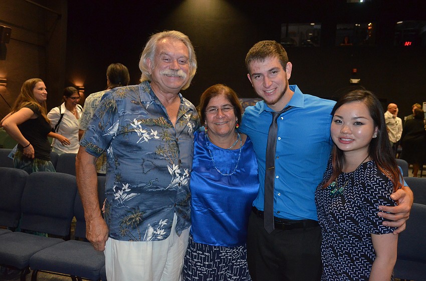 Dr. Clark’s son-in-law John Robinson, daughter Aya Konstantinou-Robinson, grandson Eli Weiss and Weiss’ fiancée Stephanie Leung