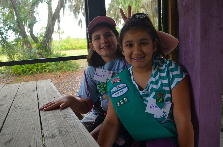 Megan McCabe and Bella Soto wait for the next presenter to begin his presentation.