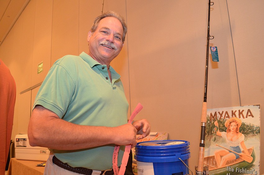 Marty Benson hopes he can get a new fishing reel as a prize from the raffle.