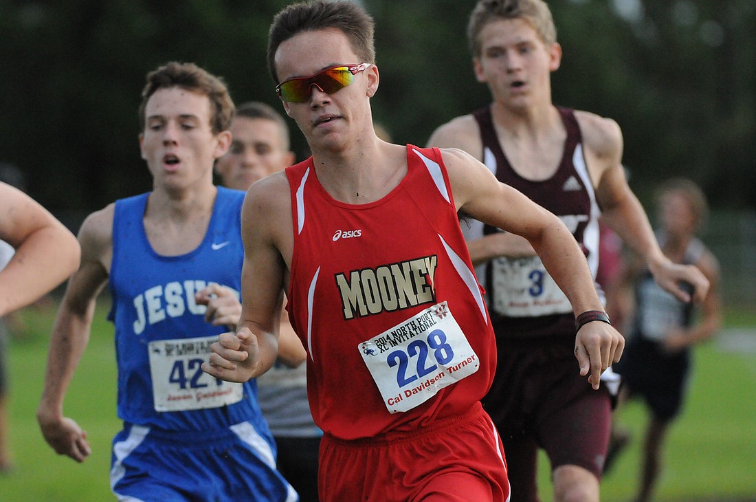 Senior Cal Davidson Turner holds four Cardinal Mooney school records for cross-country and track. File photos