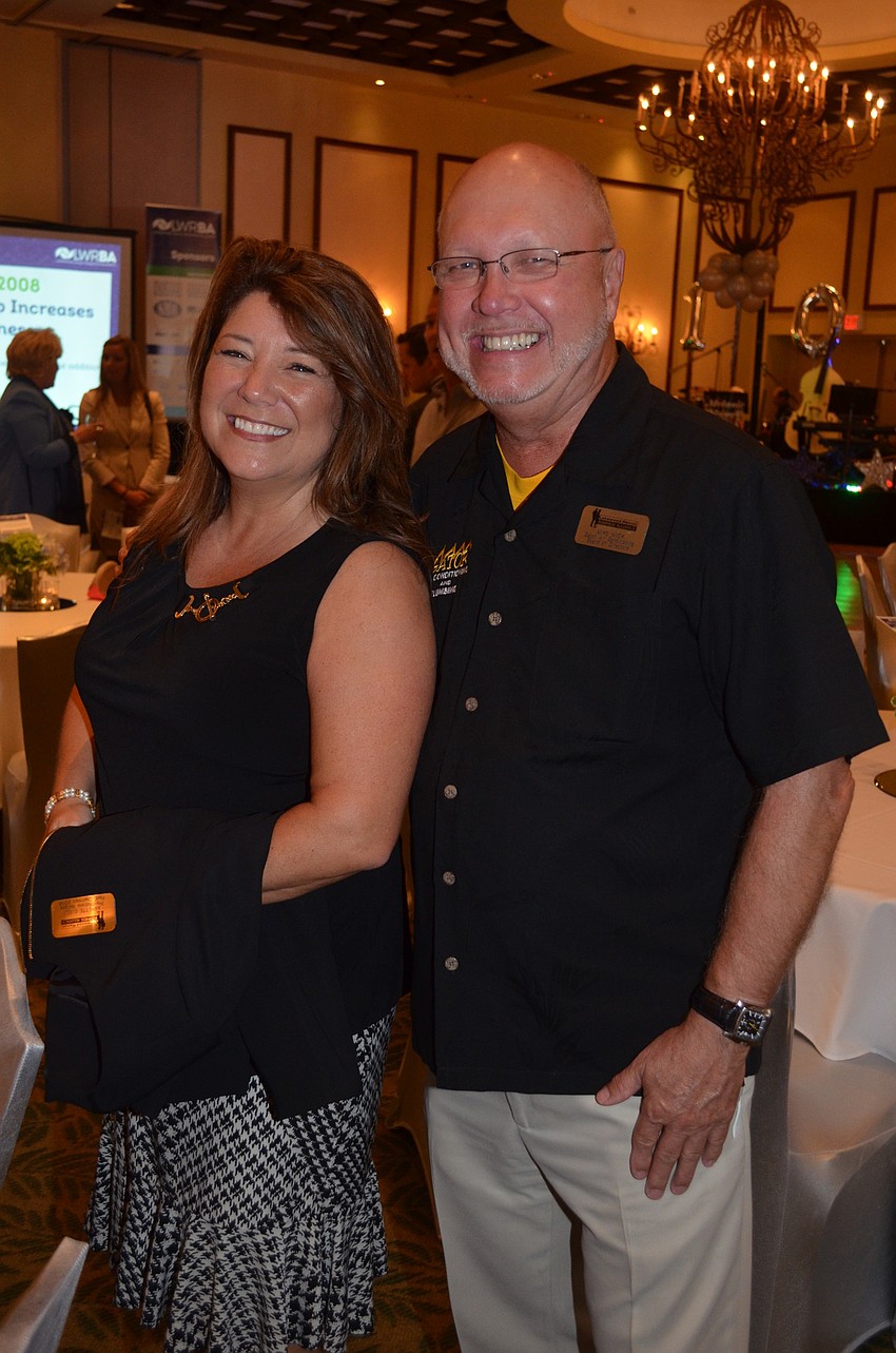 Past Chairwoman Annette Gueli shares laughs with friend and Alliance member Mike Wick.