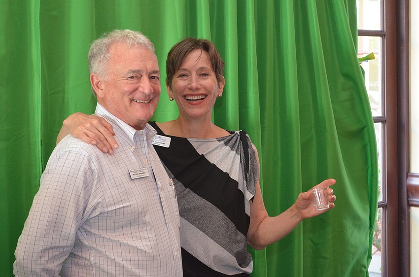 Michael and Ruth Harshman say cheese during a photo session with Tap Snap.
