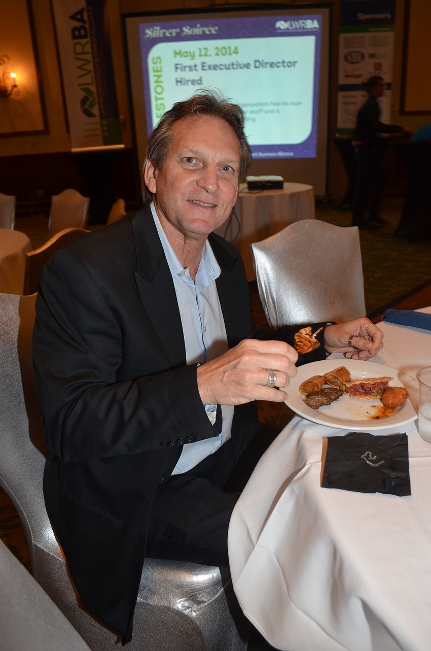Tom Knieriem enjoys a quiet moment during dinner.