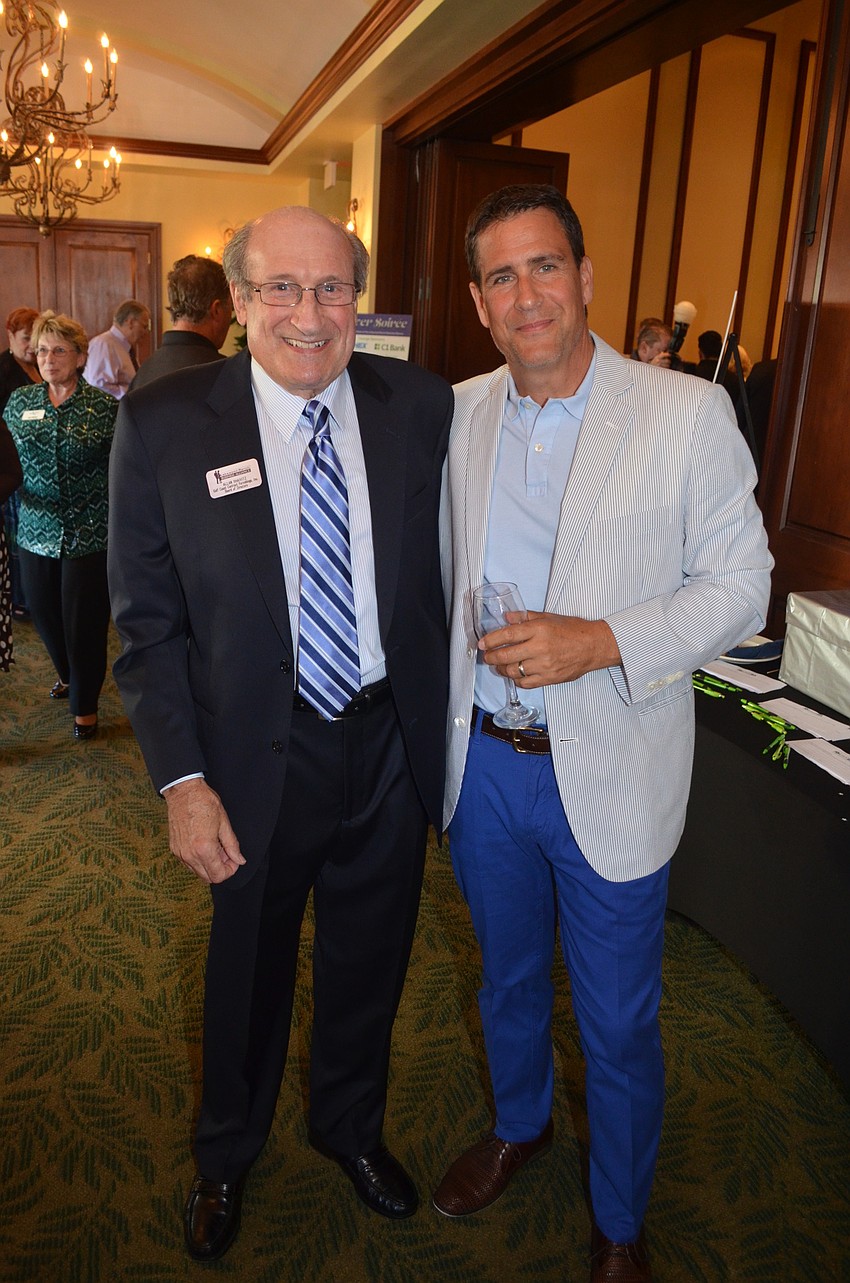 Alliance co-founder Allan Shaivitz enjoys time with alliance member Dough Phillips.