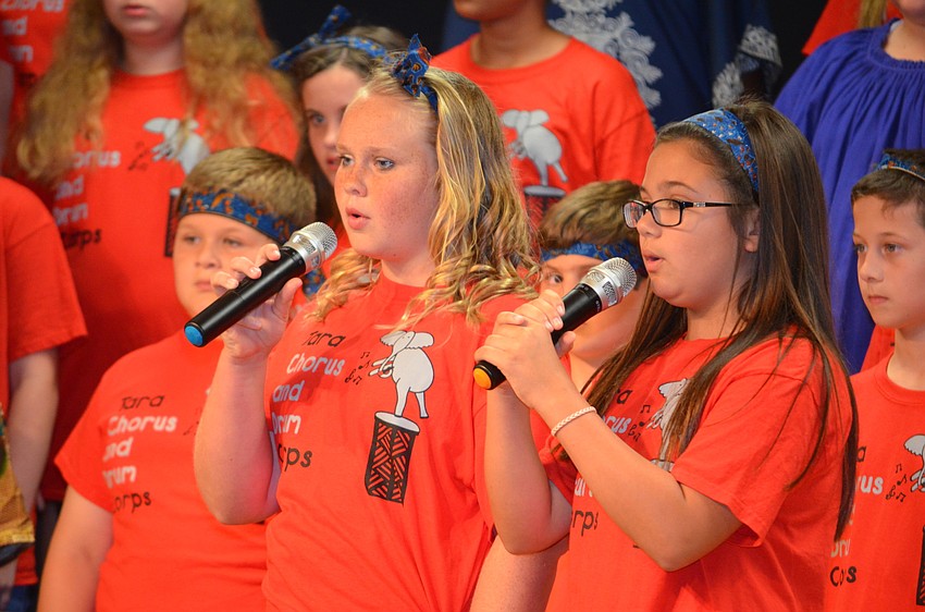 Olivia Thurber and Grace Scutti sing a duet.