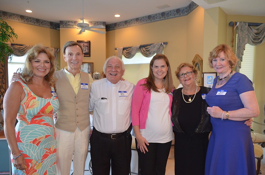 Lucy Morone, donator Louis Zazarino, the Rev. Fausto Stampiglia, St. Martha principal Siobhan Young, original school co-developer Maria DeSanto and chair Bridget Spiess