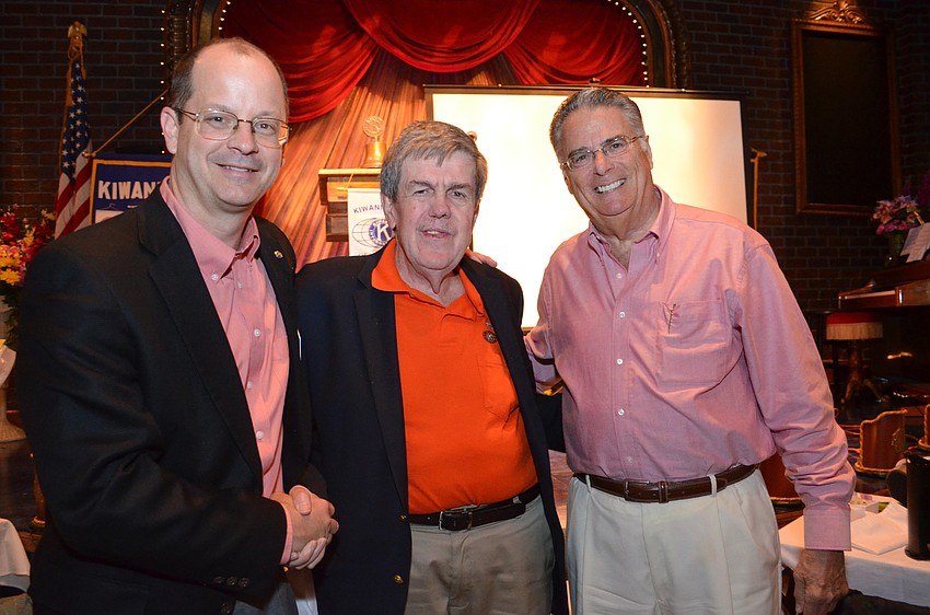The three presidents of the Kiwanis Clubs of the 18th Division North,  Sarasota President John Moore, Siesta Key President Doug Griffin and Longboat Key  President Armando Linde.