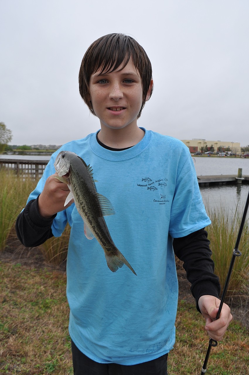 Jack White catches a 12-inch bass.
