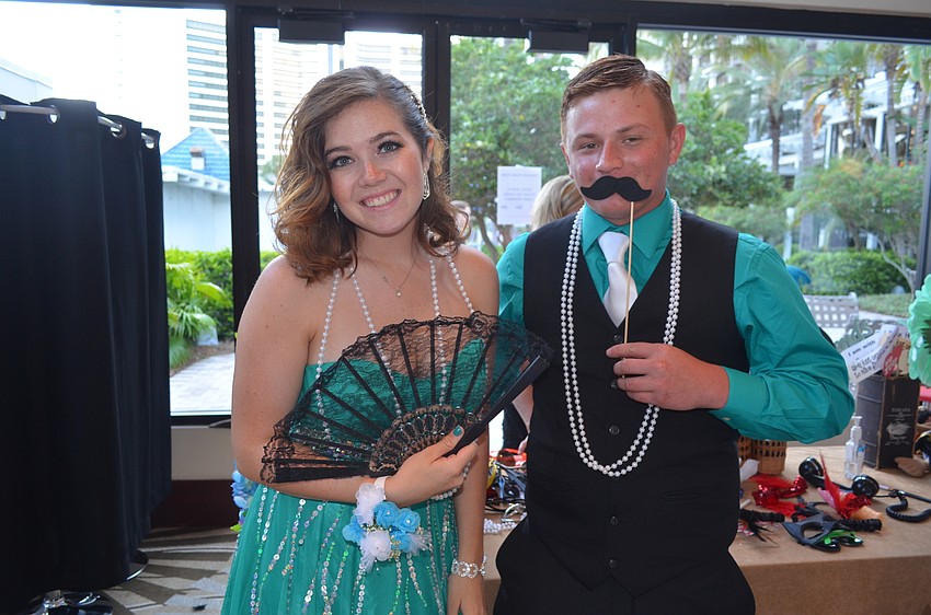 Brie Goldberg and Ramon Gonzalez enjoy the Venice Photo Booth.