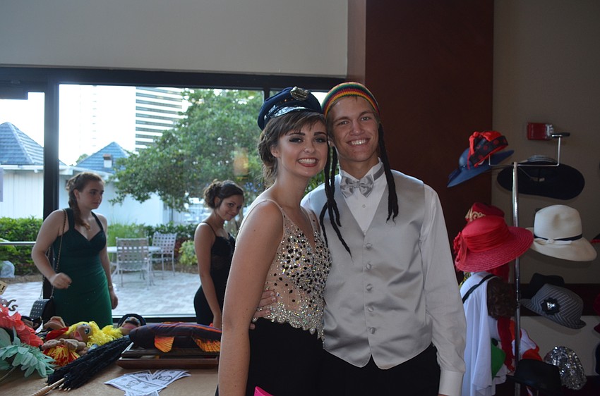 Mara Seat and Murray Alford enjoy the Venice Photo Booth.