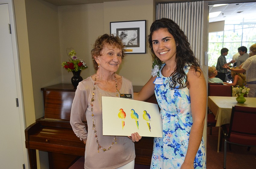 Scholarship committee chairwoman Nathalie Treonis and scholarship recipient Jessie Hernandez