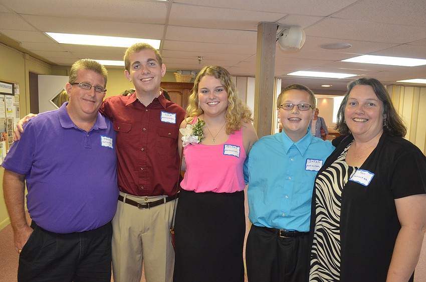 Mark, Chip, scholarship recipient Kelsey, Jared and Pam Anthofer