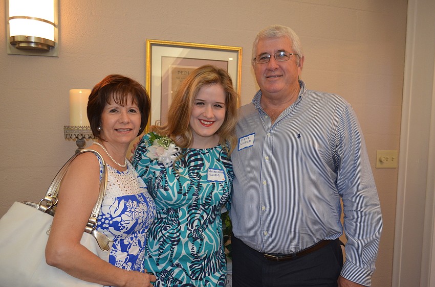 Doreen, scholarship recipient Savannah and Steve Schield