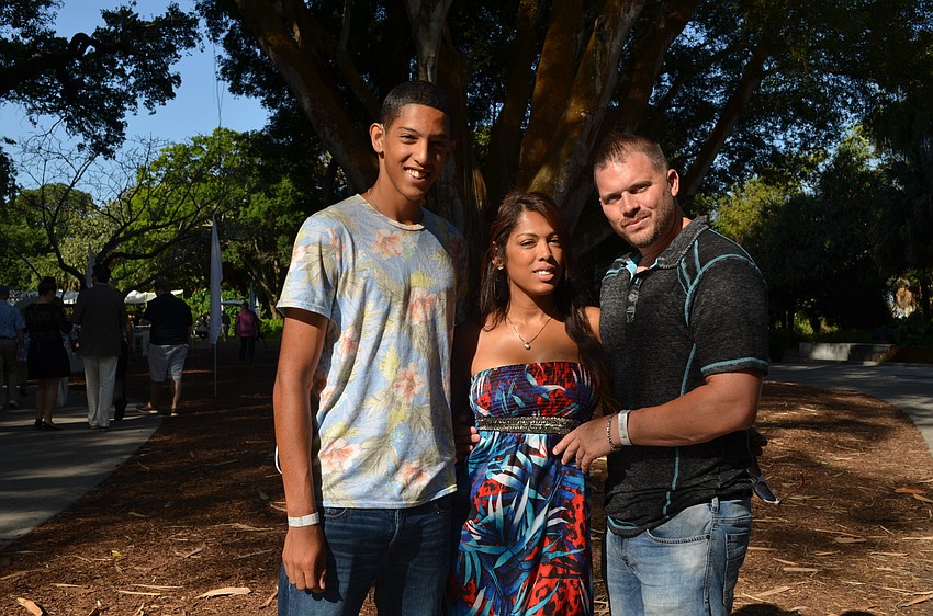 Josh Hernandez with his mother Ana Rodriguez and David Mills