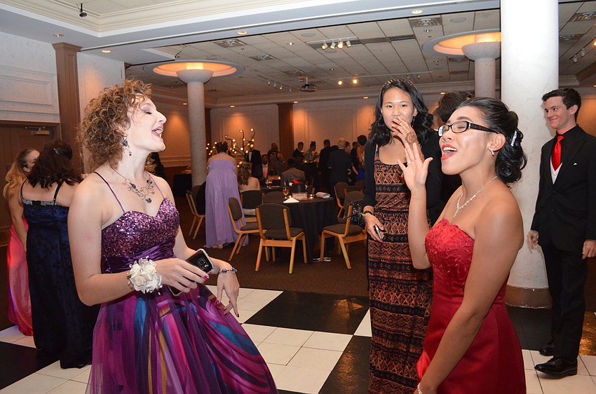 Abbie Hodgson and Kai-Lin Wilson dance to “Shake it Off” by Taylor Swift on the dance floor. Hodgson and Wilson also served as president and vice president for the prom committee.