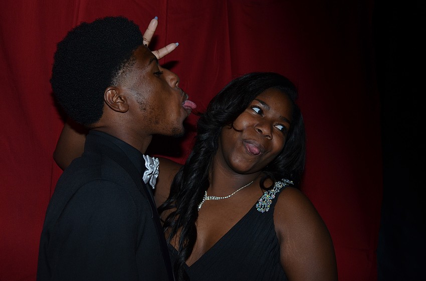 Jahar Jackson and Kellisha Bellamy give their silliest faces in the photo booth.