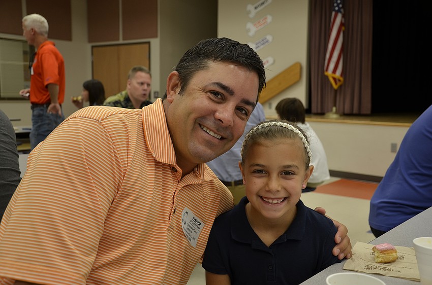 Chris Galvin and his third-grade daughter, Ella, like to go fishing together.