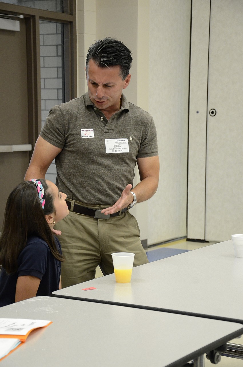 Ricardo Diaz said he was proud of third-grade daughter, Sofia, for learning French. Sofia said her dad was cool because he does Cross Fit.
