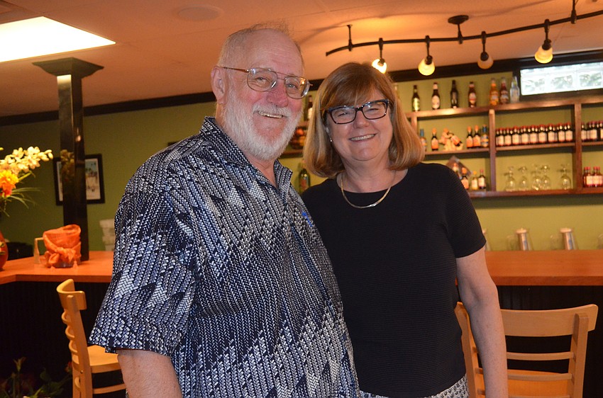 Sitting City Commissioner Stan Zimmerman and wife, Myriam Springuel at Ringling Pizza.