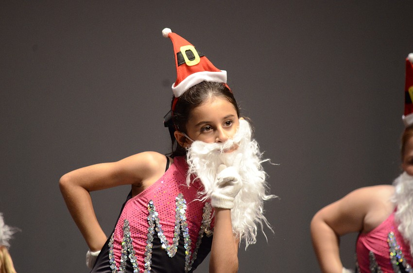 Breana Nasser, a second-grade Tara student, performs to I Can't Believe It's Christmas.