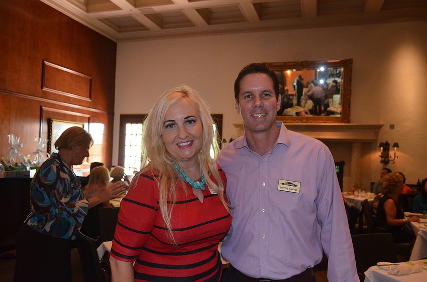 Penelope Mabrey and Jeremy George, of event sponsors SERVPRO of Bradenton