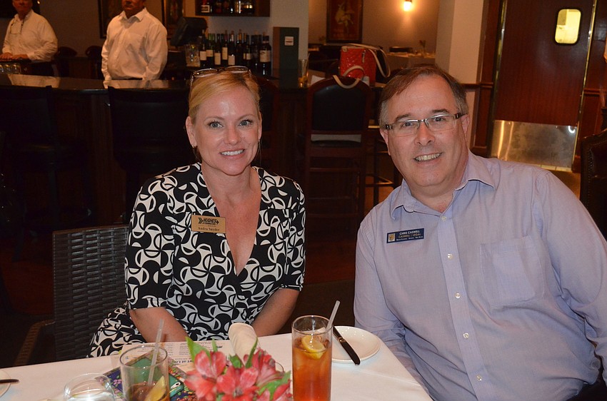 Audra Snyder, of Hughes Exterminators, and Chris Caswell, of Caswell Legal