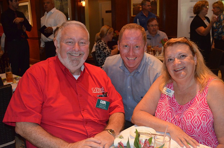 Jack Dean, of G. Fried FlooringAmerica, Robert Dinan, of Dinan Realty Group, and Luan Morrow, of Easy Transition Advisors