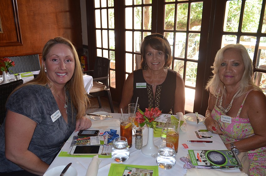 Tracy Wolfe, of Insignia Bank, Allie Hueter, of Building Connections and Janine Patrarca, of Insignia Bank