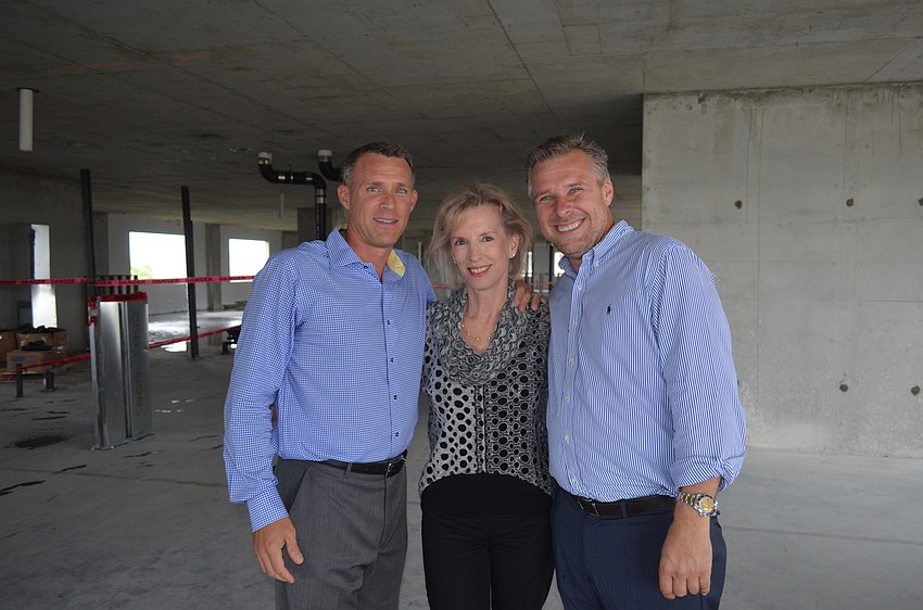 Co-developer Patrick DiPinto with Brenda Patten and Evan Berlin, of Berlin Patten Ebling