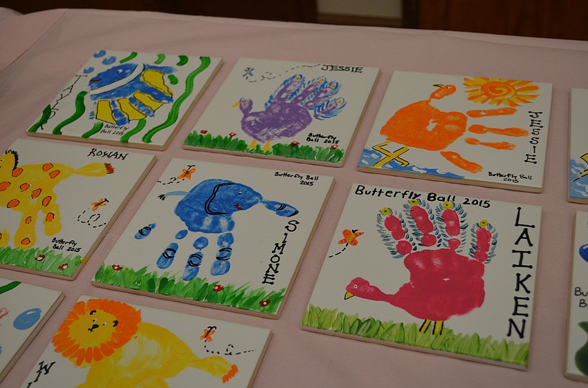 Students decorated handprints to look like animals on tiles. Parents were able to purchase the commemorative tiles to take home.