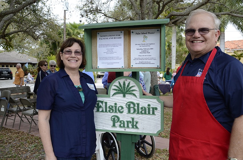 Cindy and Dale Woodling stand beside the Elsie Blair park sign. The park was named for Cindy's grandmother.