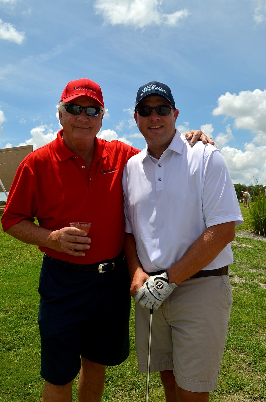 Kim French and Dave Otterness enjoy cold drinks and laughs with friends.