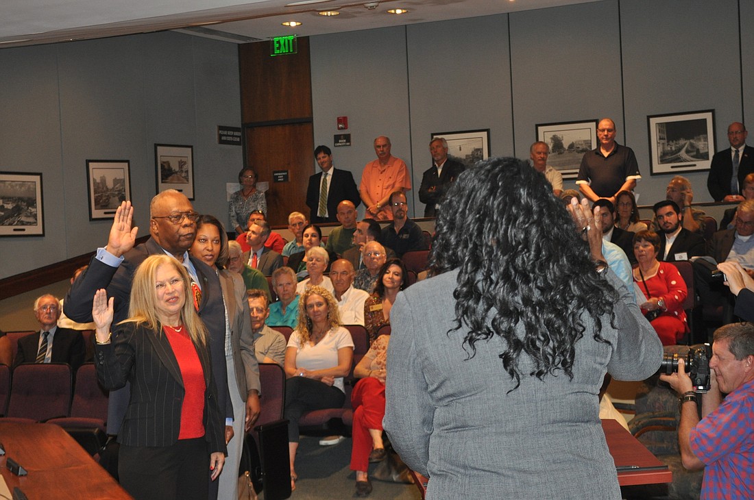 City commissioners Liz Alpert, Willie Shaw and Shelli Freeland Eddie â€” who represent Sarasota's three districts â€” were sworn in Friday afternoon.